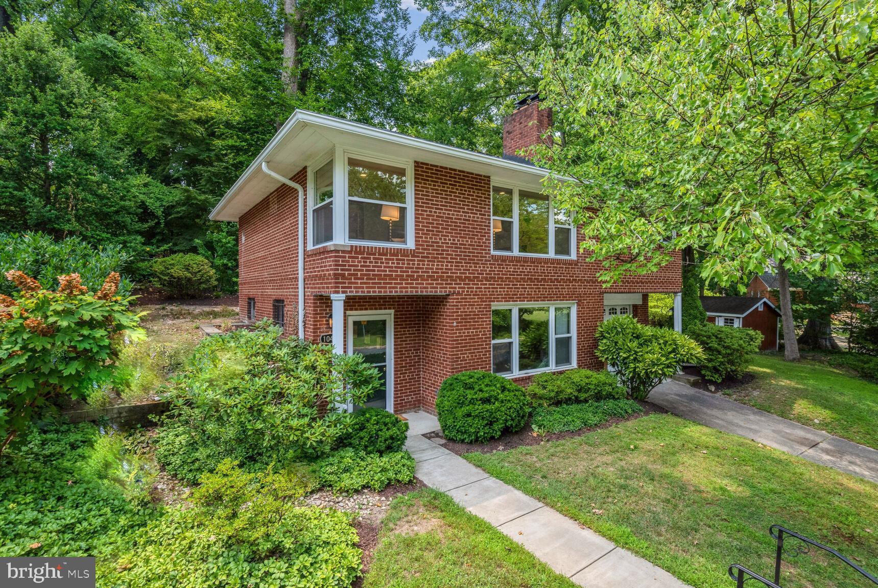 Welcome to 10418 Drumm Ave, a beautifully renovated mid-century modern gem with garage and two driveways in the highly desirable neighborhood of Homewood in Kensington. Incredible value! This solid brick home checks many “wish list”boxes: fabulous, light-filled living space, renovated kitchen and baths, two fireplaces, one woodburning, one gas, flexible floorplan, bedroom on the entry level, attached garage, gorgeous flagstone patio and more. Many upgrades including newer roof, AC, and newer windows throughout . The entry level features a spacious entry hall, bedroom/home office/multi-use room with gas fireplace, custom built in bookcases and closet, large renovated full bath and laundry/utility/storage room with door to attached garage. The main level has a fabulous floor plan and includes a large, light-filled living room with recessed lighting and wood burning fireplace, renovated kitchen with granite countertops, dining room, two bedrooms with great closet space and stunning renovated bath. A bedroom was converted to the dining room. Enjoy barbeques and entertaining on the large custom flagstone patio with stone steps to spacious yard with large shed and second driveway. Location, location,location! Just a quick walk to Homewood Park and the shops, restaurants, weekly farmer’s marketand all the activities Kensington has to offer. This property is in beautiful condition and offers the perfect opportunity to move right in and start creating lasting memories. Don't miss out on this incredible offering in the heart of Homewood.