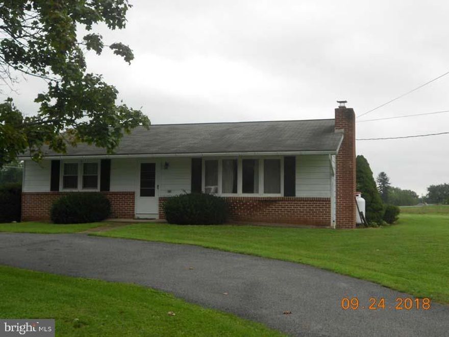 Great location for this 2 bedroom/1 bath ranch home with 3 open/level acres. Several outbuildings. Minutes to Rt 322/22 or Rt 11&15.