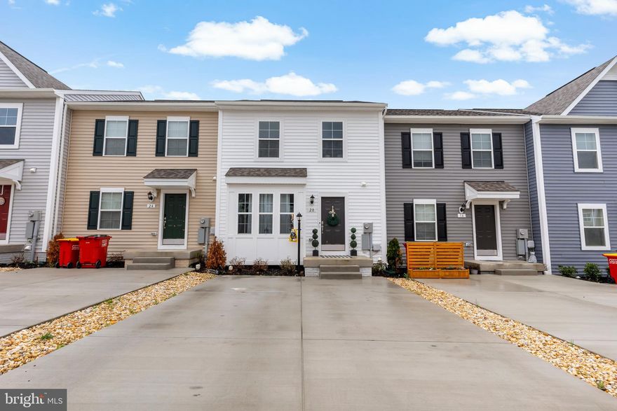 Don't miss out on the opportunity to move right into your newly constructed 2023 Colonial Townhome in Jefferson County, offering breathtaking views of the Blue Ridge Mountains! Enjoy the convenience of first-floor living with the spaciousness of a three-story layout. This home has lots to offer boasting a modern kitchen with trendy, sought-after finishes on the first floor, flowing seamlessly into a spacious living room. Upstairs, discover your personal sanctuary within the owner's suite, complete with a walk-in closet and a spa-like bathroom. Two additional bedrooms, located at the front of the home, providing privacy. The fully finished basement hosts a large bonus room, providing endless possibilities for customization to suit your lifestyle needs. Say goodbye to yard work, as the diligent HOA takes care of lawn maintenance, allowing you more time to enjoy the beauty of your surroundings. With room for four cars in the driveway, parking becomes a breeze, eliminating the need for street parking. Embrace the vibrant community and outdoor recreation opportunities within walking distance, including the scenic Jefferson Memorial Park and the charming town. To top it all off, a brand new spacious deck has been added, providing the perfect spot to relax and take in the stunning mountain views. Don't wait any longer to make this Newly Contructed 2023 Colonial Townhome that's still under builder home warranty your own piece of paradise in Jefferson County. Seize the moment and schedule a showing today before it's too late!