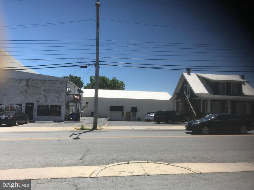 Convenient to I-81, I-70 and Route 40.  Just vacated!!  5,000 sq feet 1st  floor concrete storage with pickup truck loading dock .  Bonus,  use  wooden steps to  5000 sf wooden floored storage - mezzanine level.  9' + ceiling cement floor on loading dock level.  Additional units available at site for office or retail.