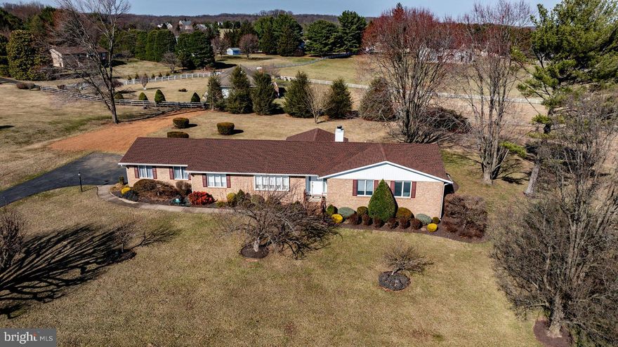 *** The seller is in receipt of contract offers. The seller requests that buyers submit their highest and best offer, without escalation clause, by 10 am on Monday, March 24. Thank you. ***This charming all brick ranch-style home, built in 1982, offers a perfect blend of comfort and functionality. With 3 spacious bedrooms and 2 full bathrooms, this well-maintained property boasts a generous 2005 sq. ft. of living space on the main level, plus a huge unfinished lower level with walk-out stairs. The inviting family room features a vaulted ceiling and gas fireplace, and a french door leads to the sunroom with sliding glass doors. Enjoy formal dining in the separate dining room or casual meals in the kitchen's cozy table space. Step outside to a beautifully landscaped 1-acre lot, perfect for outdoor enjoyment. The attached side-entry garage provides convenience. With lovely views and a peaceful atmosphere, this home is ready to welcome you. A 1 year Home Warranty is included that covers the HVAC system, all appliances, plumbing, electrical, and more. Excellent opportunity!