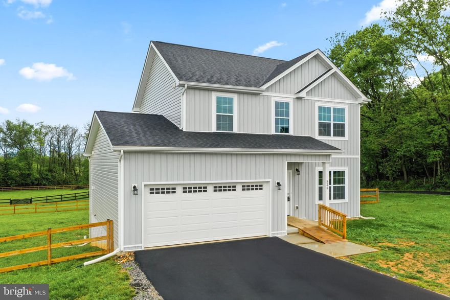 Incredible opportunity to purchase a nearly new home on an ACRE in Charles Town! This home in Milton's Landing is only 2 years old and freshly cleaned and painted and ready for you. Huge backyard with high quality wood & wire fencing. The mountain and farm views are unbeatable! Quiet cul-de-sac location, yet close to town for shopping and commuting. If you like to host parties, there is plenty of parking available, either in the 2 car garage, the paved driveway, or in the cul-de-sac! Inside, the kitchen has stainless steel appliances and granite countertops. Upstairs, the primary suite includes a large walk-in closet, vaulted ceiling, and attached bath with soaking tub, gorgeous shower, and double sink. High speed internet available through Xfinity. The walkout basement has lots of room for storage, with the potential to finish for even more living space. There is a 3 piece rough in to add a future bath. Come check out these views and envision your life on an acre of land with room to spread out!