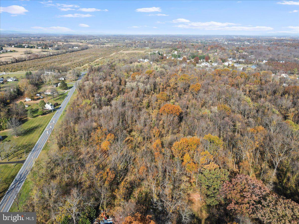 Rare opportunity to get a private lot with mature trees in southern Jefferson County, only minutes to Virginia state line! Corners are marked and septic system installation has been approved (copy of health department letter available). Limited property restrictions! Bring the animals--hobby farms are ok! Build your dream home within easy driving distance of DC, and located adjacent to several desirable subdivisions.