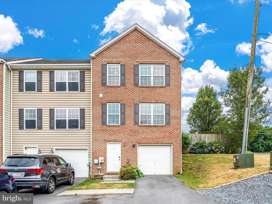 ***OPEN HOUSE - SATURDAY, JULY 20TH FROM 1-3PM*** Welcome to this spacious end-unit townhome featuring 3 bedrooms, 2 full baths, and 1 half bath, ideally situated in Martinsburg, WV, just minutes from I-81. As you step through the front door, you're greeted by a welcoming entryway that leads to the lower level recreation room, highlighted by upgraded luxury vinyl plank (LVP) flooring, which extends into the family room upstairs. The first floor also includes access to the garage and mechanical room for added convenience. Ascend to the second floor to find a bright and airy family room adjacent to a dining area adorned with a charming bay window. This floor showcases the same exquisite LVP flooring and is bathed in natural light. You'll also find a well-placed powder room and a spacious kitchen, equipped with ample counter space, stainless steel appliances, and a breakfast bar. On the third floor, a convenient laundry room awaits, along with a hallway bath, two generously sized spare bedrooms, and a primary bedroom that features two closets and an ensuite bathroom with a dual vanity and jetted tub. The outdoor space is a true highlight, boasting a larger-than-average townhome backyard fully enclosed by a 6' privacy fence, perfect for entertaining guests. This is a rare opportunity to own a townhome on a dead-end street, offering both convenience and tranquility. Close to I-81, medical offices, shopping, restaurants, and schools, this home truly has it all. Schedule your showing today and make this house your home!