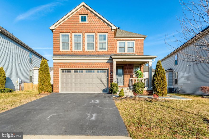 Welcome to this bright   sun filled  well maintained  6-bedroom, 5.5-bath brick-front home in the highly sought-after Eastview at Stone Ridge community, where comfort, convenience, and lifestyle come together. With over $20,000 in recent upgrades, this home features like-new appliances, freshly repainted kitchen cabinets, newly installed carpet, and freshly painted walls throughout.

The main level offers a full bedroom and full bathroom—ideal for guests, multigenerational living, or a private home office—along with a warm and inviting family room highlighted by a cozy fireplace with mantel.

Upstairs, the spacious primary suite boasts two walk-in closets and a luxurious en-suite bath with a soaking tub. Three additional bedrooms complete this level, including one with a private full bath and two connected by a Jack-and-Jill bathroom. A hardwood hallway and convenient upstairs laundry room add to the home’s thoughtful design.

The fully finished walk-up basement provides exceptional flexibility, featuring a full bedroom and bathroom, along with a dehumidifier in the mechanical room that conveys with the home.

Step outside to enjoy seamless indoor-outdoor living with a beautifully designed stone patio and walkway—over $30,000 in upgrades—that wraps around to the front of the home, perfect for entertaining or relaxing. A two-car garage and paved driveway offer ample parking.

As a resident of Eastview at Stone Ridge, you’ll enjoy resort-style amenities including multiple outdoor pools, a clubhouse with fitness center, dance rooms, and an indoor jogging track, as well as a rock climbing wall, tennis, basketball, and volleyball courts, walking trails, and playgrounds. The community also borders the 26-acre Byrne Ridge County Park, featuring sports fields, batting cages, and scenic trails.

All of this is conveniently located just minutes from Village Center shopping, Stone Springs Hospital, Gum Springs Library, and major commuter routes, with easy access to Dulles International Airport.