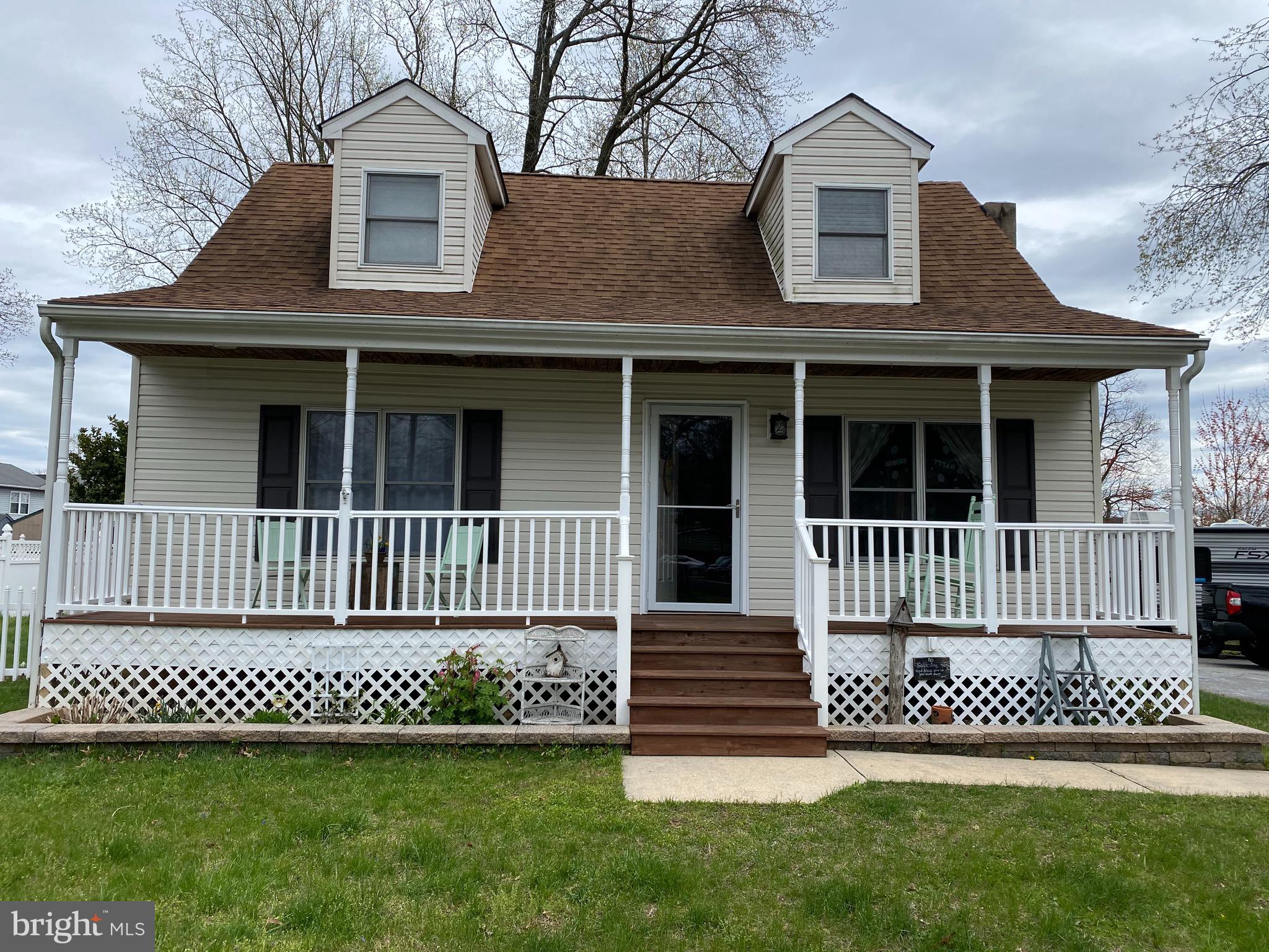 Gorgeous Cape Cod in water oriented community! Interior and Exterior have been completely remodeled! New Hardwood floors on the main level, remodeled kitchen/baths, newer roof, windows, HVAC, appliances. Spotless! House is MOVE IN READY! Water oriented community features beach, pier, club house, and activities throughout the year! Voluntary HOA $35/yr. Winter water views! Virtual Tour - https://my.matterport.com/show/?m=PA5uSWrTpoF&mls=1