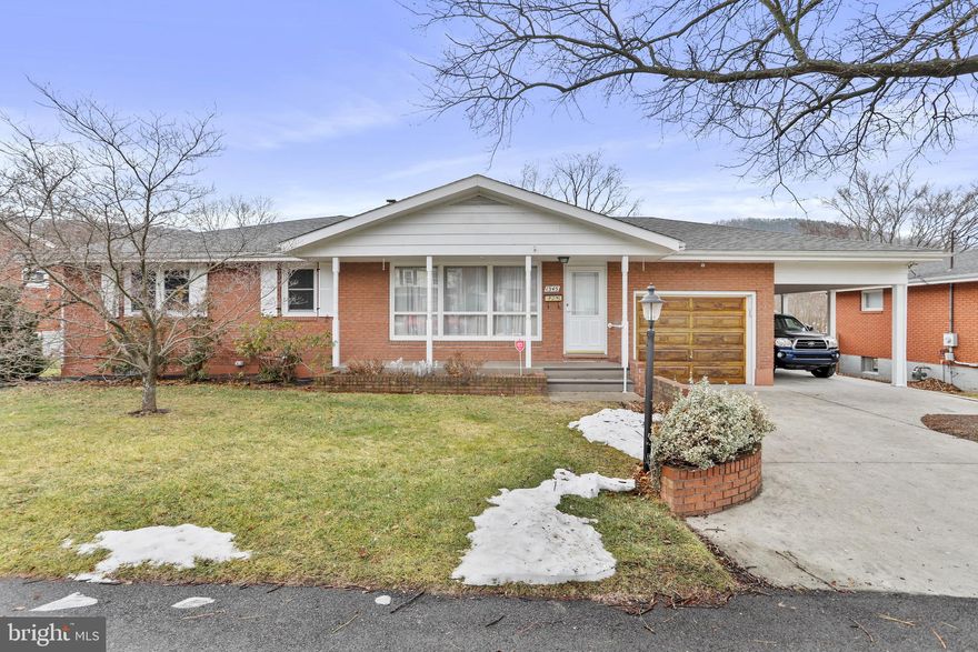 Lynmar Street has long been one of those addresses in Keyser that people quietly hope to land someday—and now the opportunity is here. Set in the Airport Addition, this classic brick ranch combines presence, practicality, and pride of ownership in a way that instantly sets it apart. Multiple garages, a finished lower level, and a fenced backyard create a property that isn’t just comfortable to live in—it’s exceptionally well-equipped for real life. Long held by the same family, this is the kind of in-town home that rarely changes hands and commands attention when it does. Inside, the main level offers a layout built for everyday living. Hardwood floors anchor the living room, while the kitchen and dining area connect easily for family meals and entertaining. An addition expands the footprint with a spacious family room, giving you two distinct gathering spaces on the main floor. Three bedrooms and two full baths complete this level, including a primary suite featuring a Jacuzzi tub and separate shower. Flooring throughout is a practical mix of hardwood, carpet, and vinyl. The partially finished basement adds another layer of flexibility. Bright and functional, it features a brick hearth with a freestanding gas stove for supplemental heat, excellent storage, a half bath, and room to create a fourth bedroom, office, or hobby space—perfect for guests or extended living needs. The home is equipped with a forced-air natural gas furnace, central air conditioning, and natural gas service, providing dependable year-round comfort. Step outside and you’ll appreciate how much this property offers for an in-town setting. The fenced backyard provides privacy for pets, play, or gardening, while the parking and garage setup is exceptional: a one-car carport, a one-car attached garage, and a two-car detached garage create space for vehicles, workshops, storage, and weekend projects—features that are increasingly difficult to find inside city limits. Strong construction, a prime neighborhood, and room to live, work, and grow all come together here. Whether you’re a longtime Keyser resident waiting for the right opportunity or relocating and searching for a home that delivers both convenience and staying power, this Airport Addition ranch stands tall in today’s market. Homes with this level of location, utility, and flexibility do not surface often—schedule your showing and see why this Lynmar Street property is poised to become one of Keyser’s most compelling in-town offerings.