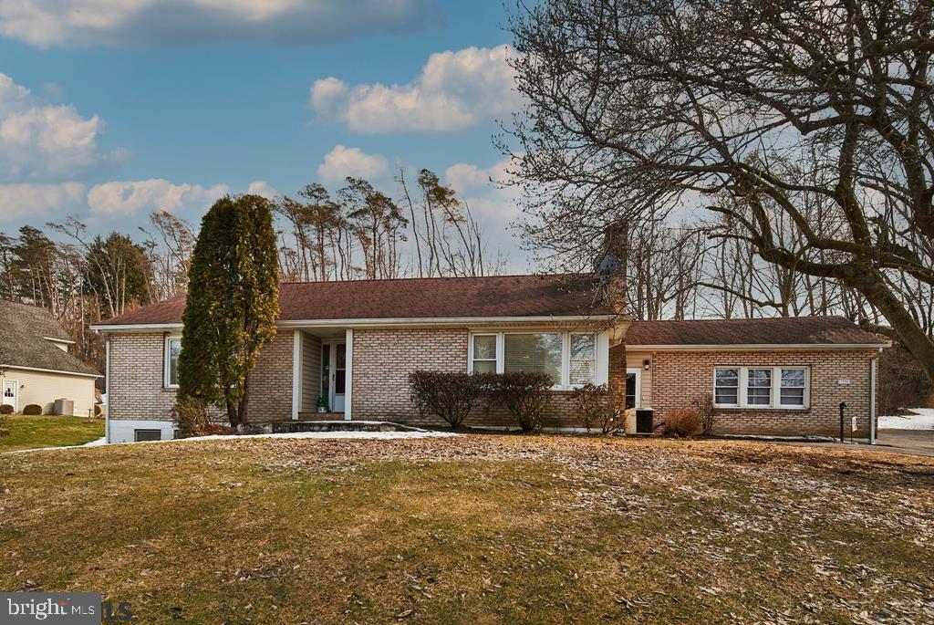 Impeccable brick ranch with a spacious yard, above ground pool and garage in beautiful Bellefonte. An ample living room with pristine hardwood floors features an abundance of natural light, wood burning fireplace and tastefully appointed fresh paint. Bespoke updates to the comprehensive kitchen with peninsula seating include, new flooring, fresh paint and new hardware throughout. Two roomy bedrooms and full bathroom comprise the upstairs; downstairs an unfinished basement space is large enough for additional storage or the possibility of finishing with a full bathroom already in place. Charming and move in ready, the seller has relocated for a job opportunity.