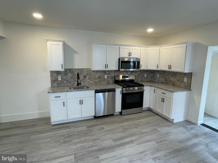 This Robesonia Semi Detached home, in the Conrad Weiser School District, has been completely renovated inside, from top to bottom, and is in LIKE NEW condition! There is a newly poured, concrete patio in the rear, with a nice flat yard and access to an oversized, 14'X25' detached garage, with storage room above, along the rear alley. This home has a beautiful eat in kitchen with white cabinetry, granite counter tops, and a subway tile back splash, with new stainless-steel appliances. There is a mudroom to the rear of the kitchen and a brand-new convenient half bath for the first floor, and brand-new luxury vinyl plank flooring throughout the first floor and in both bathrooms. The entire home has been repainted, and the stairs and upper bedrooms have brand new neutral grey carpeting. The second floor is served by a fully renovated family bath with a shower-tub combination. The basement is full and is bone dry, with a natural gas boiler and natural gas hot water heater, making this home energy efficient and cost effective, with super low property taxes. All you'll need to do in MOVE RIGHT IN!!!