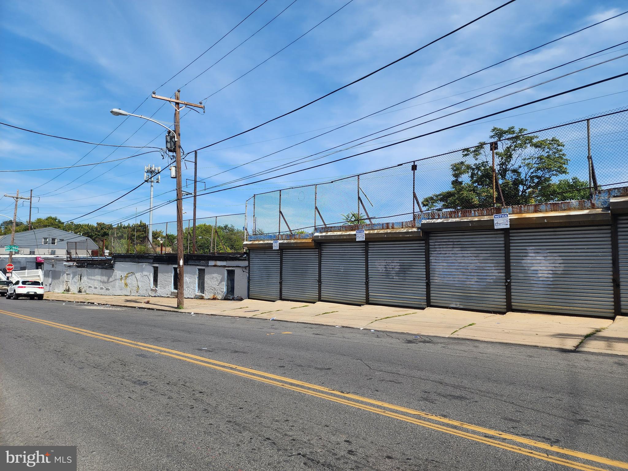 1.08 acres of land with cash business. Would be ideal to have auto body or engine repair business there. Also has 16 garages rented. Property can be divided into 2 parcels with 2 entrances. A 14 foot wide gate to 6th Street. Also a 23 foot wide entrance on Annsbury Street, 1300 sq ft office space and a 2400 sq ft warehouse/garage space. Also available for development into new construction.
