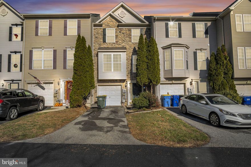 Beautiful stone exterior and well maintained  townhome in Dallastown schools with a low HOA!   It has all - 3 bedrooms, 2 full bathrooms and one half bathroom, it has over about 1850 sqf living space, hardwood flooring,  gas fireplace, newer painted walls, 2 decks, level yard, one car garage with additional parks spaces outside, convenient location offers to get to all of shopping areas and highways and so much more. Schedule your tours and showing today!