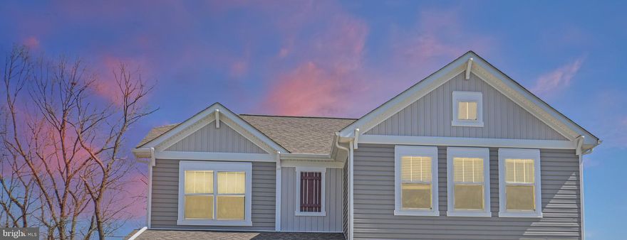 Welcome to your dream home! This stunning home in the desirable Preserve at Long Branch community boasts a perfect blend of comfort, style, functionality, and convenience--and it features a hard-to-find main level guest bedroom and full bath!! This home is only 2 years old and shows like a model! With beautiful (and durable) luxury vinyl planking floors, upgraded stylish and modern lighting and an open concept floorplan, it checks all the boxes!  The upgraded eat-in kitchen is a chef's delight, with stainless steel appliances, quartz countertops and a large island perfect for meal prep and entertaining. The spacious pantry and plenty of cabinetry make organizing and storing your kitchen essentials a breeze. The main floor also features a living area, family room and a walk-out to the expansive deck with stairs to the patio below. The upper level boasts the Primary Suite and two additional spacious bedrooms and a luxurious hall bathroom, as well as a large loft with three large closets! Plus, there is a convenient bedroom-level laundry room. The Primary Suite is a true oasis, complete with a large walk-in closet and an ensuite bathroom that features a soaking tub, separate tiled shower, and a dual vanity. The lower walk-out level is light-filled and offers a large recreational area, providing endless possibilities for entertainment and relaxation, and a spacious storage area and an extra bedroom-ready room with window and plumbing rough-in. And if you're looking for privacy, you'll love the private backyard with a deck, patio, and privacy fence - perfect for outdoor gatherings and relaxation. Located in an ideal location, this home is just a short distance from a variety of shops and restaurants, as well as the charming downtown area of Frederick, offering endless entertainment options. Additionally, the Blue Ribbon schools, and easy access to major commuter routes, make this home a must-see. With all of these amazing features, this home truly offers the perfect combination of convenience, comfort, and style. Don't miss out on the opportunity to make this stunning house your home. Contact us today to schedule a viewing or come to the OPEN HOUSE Saturday 12-2.