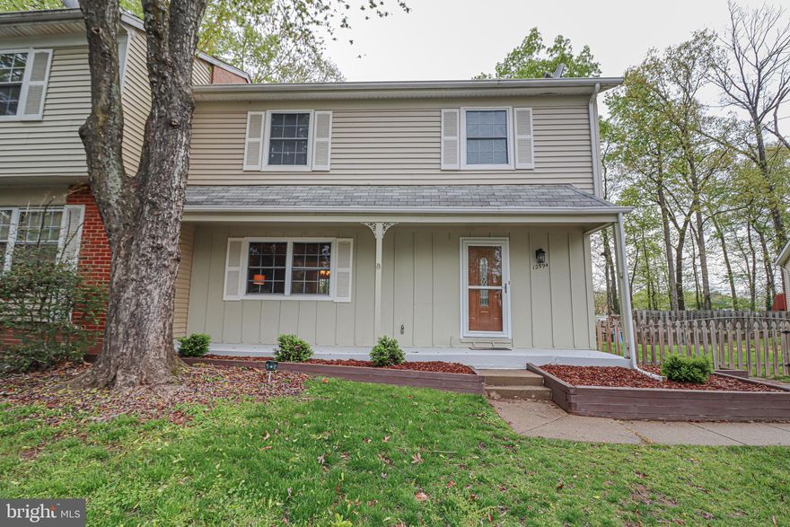 Welcome home to your new Duplex - better than townhome living because you have a HUGE fenced yard w/ storage shed, your own driveway, and plenty of street parking (no need to have parking passes or assigned spots)!   Plenty of space in this three-level home in a cul-de-sac with three bedrooms and two full baths upstairs and the primary bedroom is huge with tons of closet space and a large sitting room/nursery and a private primary bathroom.   Primary bathroom has new tile in the stand-up shower and a tile floor.  The main level boasts a spacious kitchen with a five-burner gas stove, stainless steel appliances, microwave, and refrigerator with an ice maker.  Main level half bathroom is conveniently located off the kitchen.    Spacious living room has beautiful crown molding and laminate wood-like floor.  Separate dining room with wood-like laminate flooring opens to deck in back yard.  You will fall in love with the basement, a separate living area all in itself  with a den/ 4th bedroom, full bath with tile shower and a large rec room.  Entire basement is carpeted.  Laundry room in basement boasts Samsung washer and dryer.   The back yard is where you will really love having a duplex versus living in a townhouse due to its spaciousness -- deck in back yard with plenty of room for a garden, play equipment, or even a trampoline.  There is a side door that leads to back yard for easy exit/entry in addition to the patio door leading from the house to the deck.    Woodbridge High School can be seen from your back yard.   New storm doors; HVAC/AC only 1-1/2 years old; roof approx. 10-12 years old.  On top of all of this, you get all of the amenities included as being part of the Lake Ridge Homeowner's Association.  You can check out the abundance of amenities here that include, among other things: boat slip, baseball field, basketball and tennis court, walking paths, swimming pools, club houses/party rooms, and more:  https://lakeridgeva.com/.   Hurry, this won't last long!