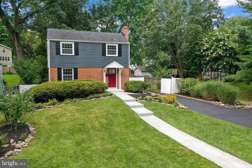 This elegant colonial located in the sought after community of Woodmoor has been completely renovated. This expanded home with 3 bedrooms and 2 baths invites you into a formal sitting room - complete with a custom designed reclaimed brick wood-burning fireplace surround and hearth. A custom-built bookshelf with a cabinet and exotic quartz countertop offers additional storage. The dining room is open to the brand-new kitchen with soft-close cabinets, exotic quartz countertops, and new Stainless Steel Samsung appliances. The work station sink maximizes space allowing you to strain and cut right over the sink. The beautiful kitchen backsplash gives the space an elegant touch. The kitchen island offers additional counter and storage space. 

The bright, window lined living room offers plenty of space for couches and a large TV while still feeling open to the kitchen. 

The upstairs has 3 bedrooms including a larger owner's suite with his and her closets. The upstairs is also home to a full bathroom that has been completely renovated with luxurious touches. 

The basement offers additional living space, a large shelving area, a laundry area, and another full bathroom with an impressive Alaska White tiled stand-up shower. 

The home has brand-new windows, flooring, tile, doors (inside and out), trim, cabinets, vanities, toilets, bathtubs, siding, gutters and more! The home also has a Generac back-up generator!

Lush landscaping decorates the entire property. The long driveway, that leads to the detached garage, has plenty of parking space and a private gate for extra privacy. The detached garage has been recently painted and has a new roof and offers space for two vehicles, or 1 car with plenty of space for a workshop. Additional storage space can be found in the garage loft.  

The moss-covered brick patio carries old world charm and would be a perfect peaceful oasis for a fire-pit and Edison strung lights to enjoy the upcoming Autumn nights. The large backyard extends past the black gate, behind the garage, offering even more space perfect for a garden or play area. 

Enjoy all the benefits of being a part of the Woodmoor community known for it’s tree-lined streets and friendly community as well as it’s proximity to Pinecrest Park which has playgrounds for all ages, picnic tables, a community center, sports fields, a walking path, and tennis courts. The home is a short distance to two shopping centers at Woodmoor and Burnt Mills, offering a multitude of stores and shops including Trader Joe's, Target, Giant, Aldi, Starbuck's, and the famous Woodmoor Bakery. 

Woodmoor offers a suburban setting where neighborhood events such as Woodmoorstock, Oktoberfest, holiday tree lighting and parades take place. All while being just a short distance from the vibrant amenities of downtown Silver Spring and easy access to Washington, D.C. and surrounding areas via nearby major highways and public transportation. Don’t miss this opportunity to make this one-of-a-kind home yours.