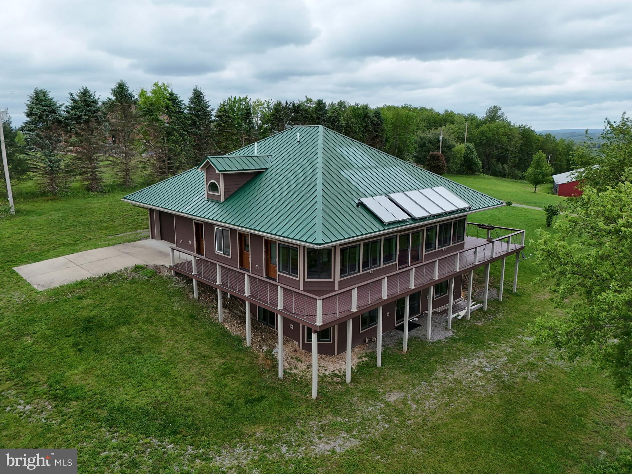 Beautiful Off-Grid Home on 19.67 Acres with Barn & Stunning Mountain Views
Discover your perfect retreat on this expansive 19.67-acre property, offering tranquility, privacy, and endless possibilities. This Unique home, approximately 11 years old, is fully off-grid with sustainable solar panels and geothermal heating, ensuring energy efficiency and independence . Open Concept Design: The main & Lower level both offer a modern kitchen, dining area, and living room seamlessly connected, all featuring breathtaking mountain vistas that create a serene and inspiring atmosphere. 4 car attached garage.