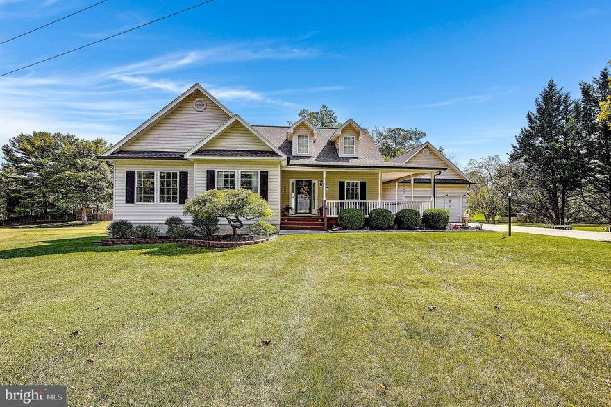 Don’t miss this beautifully maintained and thoughtfully updated ranch-style home, nestled on a serene 2.1-acre lot that offers both privacy and an unbeatable location. Perfectly situated just minutes from Fort Meade, Washington D.C., Virginia, Baltimore, and Annapolis, this property combines convenience with tranquil living. As you arrive, you’ll be welcomed by a charming front porch—ideal for morning coffee or evening relaxation. Step inside and you’ll immediately notice the stunning hardwood floors that flow throughout the main living areas. The gourmet kitchen features 42” cabinetry, granite countertops, a peninsula with bar seating, and sleek stainless steel appliances. A bright and airy breakfast area overlooks the private backyard and leads directly to the expansive Trex deck—perfect for entertaining or unwinding in nature. The kitchen seamlessly connects to the spacious family room, where soaring cathedral ceilings and large windows fill the space with natural light. Glass sliders open to the beautifully landscaped backyard, creating a seamless indoor-outdoor flow. The main-level primary suite is a true retreat, offering a generous walk-in closet and a luxurious spa-inspired bathroom complete with a soaking tub, oversized shower, and dual vanity. Two additional well-sized bedrooms and a full guest bathroom provide ample space for family or guests. A convenient mudroom and laundry area are located just off the attached two-car garage.
The fully finished lower level is an entertainer’s dream! Enjoy a spacious recreation area with a built-in bar, pool table space, custom shelving, a dedicated home gym, and a half bath for added convenience.  There is also a workshop for all your projects. Outdoor living is the highlight of this home. Relax or entertain on the newer Trex deck, overlooking a sparkling pool, cozy fire pit, and horseshoe pit. A detached two-car garage offers additional storage, a workbench, and space for hobbies or extra vehicles. Additional upgrades include a new roof on both the home and detached garage, new gutters, a hot water heater (within the last 3 years), updated pool liner, and a Watchdog battery backup system for the sump pump. Enjoy the perfect blend of peaceful country living with unbeatable access to major cities, shopping, dining, and more. This home truly has it all—schedule your private showing today!