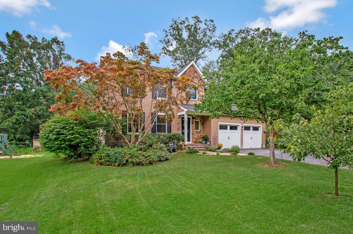 This stunning home blends classic charm with modern updates, offering a spacious and elegant layout designed for comfortable living and effortless entertaining. The renovated kitchen features soft-close cabinetry, granite countertops, recessed and pendant lighting, and opens to a cozy breakfast area and inviting family room with a wood-burning fireplace. A formal dining room and gleaming hardwood floors throughout the main level and all above-ground living areas elevate the home’s sophisticated appeal.
The expansive primary suite has been beautifully updated with a luxurious ensuite bath, showcasing a double vanity, soaking tub, glass-enclosed shower, and an oversized walk-in closet. The fully finished walk-out basement offers a large recreation room and an additional full bath, perfect for guests or versatile living space.
Major exterior upgrades, including a new deck, enhanced siding, and stonework, ensure both style and peace of mind. Situated on a serene 0.64-acre lot in a quiet cul-de-sac, this property offers ample parking, a fully fenced backyard, and a private wooded backdrop with a ravine and stream, providing an ideal retreat just minutes from major commuter routes and everyday conveniences.
