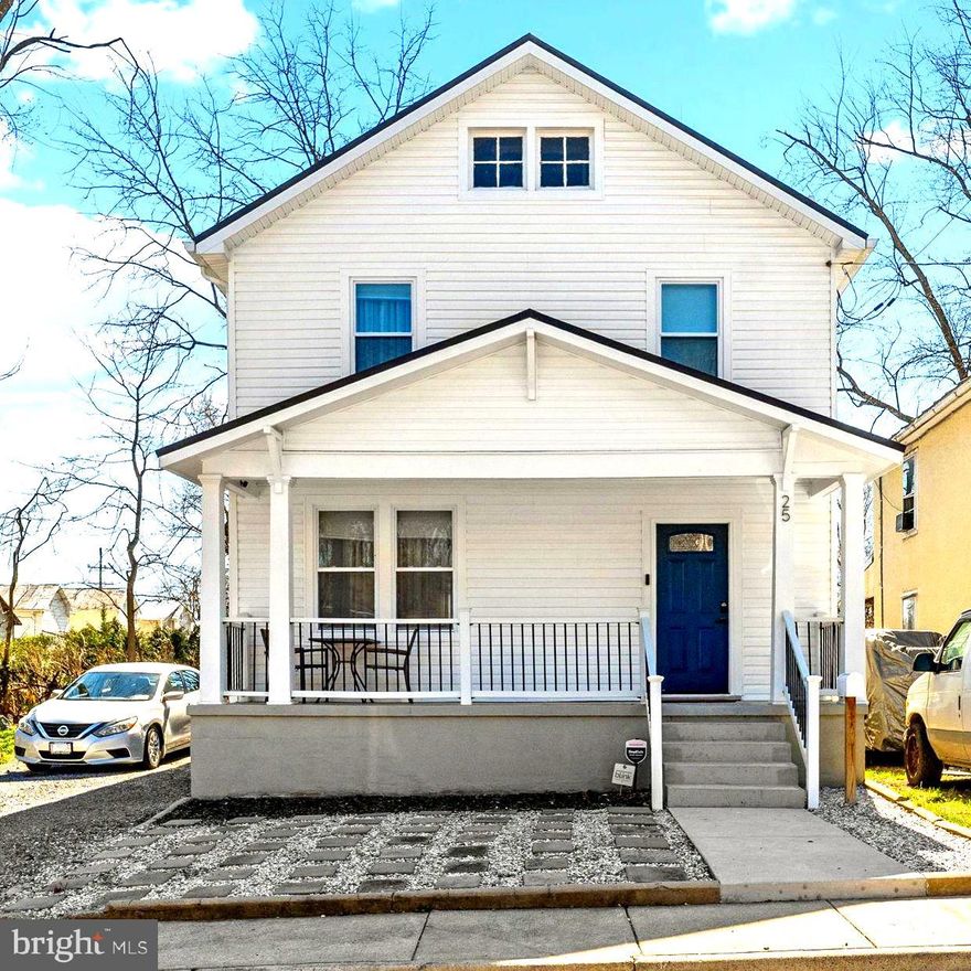 Welcome to this beautifully updated gem in the heart of Winchester! From the moment you arrive, the expansive front porch invites you to sit back and enjoy the charm of one of the city's most sought-after locations. Situated just moments from Handley High School, vibrant downtown shops, local restaurants, and scenic parks, this home offers the perfect balance of neighborhood tranquility and commuter convenience. Step inside to find a light-filled interior boasting glistening hardwood floors, crisp neutral paint, updated light fixtures, and elegant crown molding throughout. The main level features a comfortable living room and a spacious formal dining room complete with a built-in bar and custom shelving—perfect for hosting dinner parties. The chef-inspired kitchen has been modernized with sleek cabinetry, a stylish backsplash, and stainless steel appliances, while a convenient main-level laundry room and half bath add to the home's practical layout. The upper level is a private retreat, headlined by a primary suite featuring a stunningly renovated ensuite bath with double sinks and a custom-tiled walk-in shower. Two additional generously sized bedrooms and a second updated full bath provide plenty of space for family or guests. For those seeking even more flexibility, the finished lower level offers a versatile space ideal for a home gym, media room, office or play area. Outdoor living is a true highlight here; relax on the rear deck overlooking a meticulously maintained yard and a fully fenced-in backyard, where large mature trees and charming garden beds create a private, picturesque oasis. With off-street parking and every modern finish already in place, 25 W Southwerk St is ready for you to call it home.