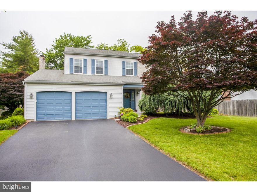 Welcome home to this meticulously maintained Joshua Knoll Colonial with 4 Bedrooms and 2.1 baths in Whitemarsh Township. Enter foyer on the first floor with spacious living room and dining room, kitchen with new stainless steel appliance, new flooring, pantry closet and separate eating area, step down to family room with brick fireplace, sliding door leads to sunroom and deck that overlooks the fenced in yard.  Powder room and laundry room with new tiled floor complete the first floor. 2nd floor has a  Master bedroom with walk in closet and a new remodeled private bathroom, 3 additional bedrooms and hall bathroom with new fixtures. Finished basement adds an additional 500 square ft (not included in tax records) of living space in walking distance to 3 colonial schools, walking trail and parks. Freshly painted and new carpeting throughout.  Two car garage and a One year home warranty.