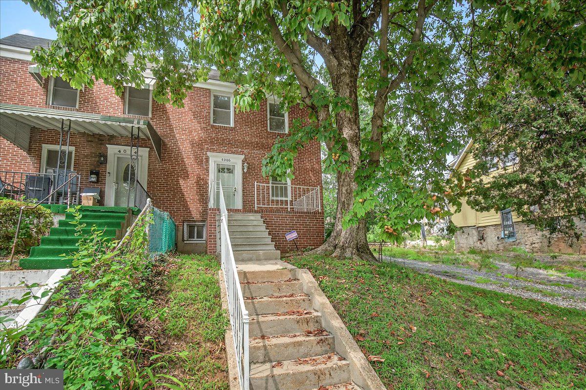 Welcome to 4006 Greenspring Avenue! This move-in-ready 3-bedroom, 2-bath semi-detached home offers convenient living near the highway. Enjoy refinished hardwood floors, fresh paint, stainless steel appliances, and granite counters. The main floor has a spacious living area, dining and remodeled kitchen; upstairs there are three spacious bedrooms and a full bath. The finished basement includes a family room, full bath, laundry, and walkout stairs. Outside, there's a fenced backyard, deck for entertaining, and rear parking.
