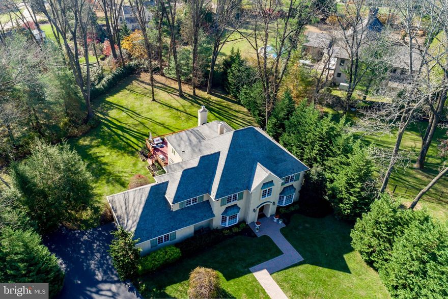 Welcome to this beautifully appointed and meticulously updated home, situated at the end of a cul-de-sac in the heart of Bryn Mawr, Lower Merion Township. If you are looking for an absolutely pristine and MOVE-IN ready listing, look no further! The idyllic three-quarter acre property sits upon the prime lot of this quiet neighborhood, and is located within a 20 minute walk of the Rosemont train station. Light and bright, young and hip, the current owners have added four NEW BATHS, and this TURN KEY home also boasts a  Chef's Kitchen located at the core of the main floor, featuring a sit-at island, and Viking and Sub-Zero appliances. All this connects  to the dining, breakfast, and FAMILY rooms, as well as the mudroom, pantry, laundry room and garage, with open views of the very PRIVATE rear yard. The main floor plan also includes a GUEST SUITE/OFFICE with built in cabinets and desk and, along with other rooms currently tasked as office space, this is a WORK FROM HOME HAVEN! On the second floor, a fabulous MASTER bedroom suite  offers a WALK-In closet/dressing room as well as a  frameless/curbless shower,  water closet area, double sink and soaking tub. An additional bedroom suite, two more bedrooms and bath await.  A bone dry finished lower level contains a full bath and additional space for guests to stay or just for play, as well as a walk-in cedar closet. Even the foyer chandelier is motorized for ease of changing out bulbs! Very low utility costs, with two zones of HVAC, ON DEMAND hot water fueled by natural gas and plenty of storage.  Circular driveway, wrap-around Trex decking, hard piped gas barbeque, newer roof, and natural, non-chemical lawn care round out this spectacular property, as well as a clean pre-listing stucco report.  Check out the 3D virtual tour at https://my.matterport.com/show/?m=PQmaCX5JGGQ&brand=0 .This is the one you've been WAITING FOR, and appointment requests may be made  NOW in order to accommodate showings with best hygienic practices in mind and for the safety and peace of mind for all.