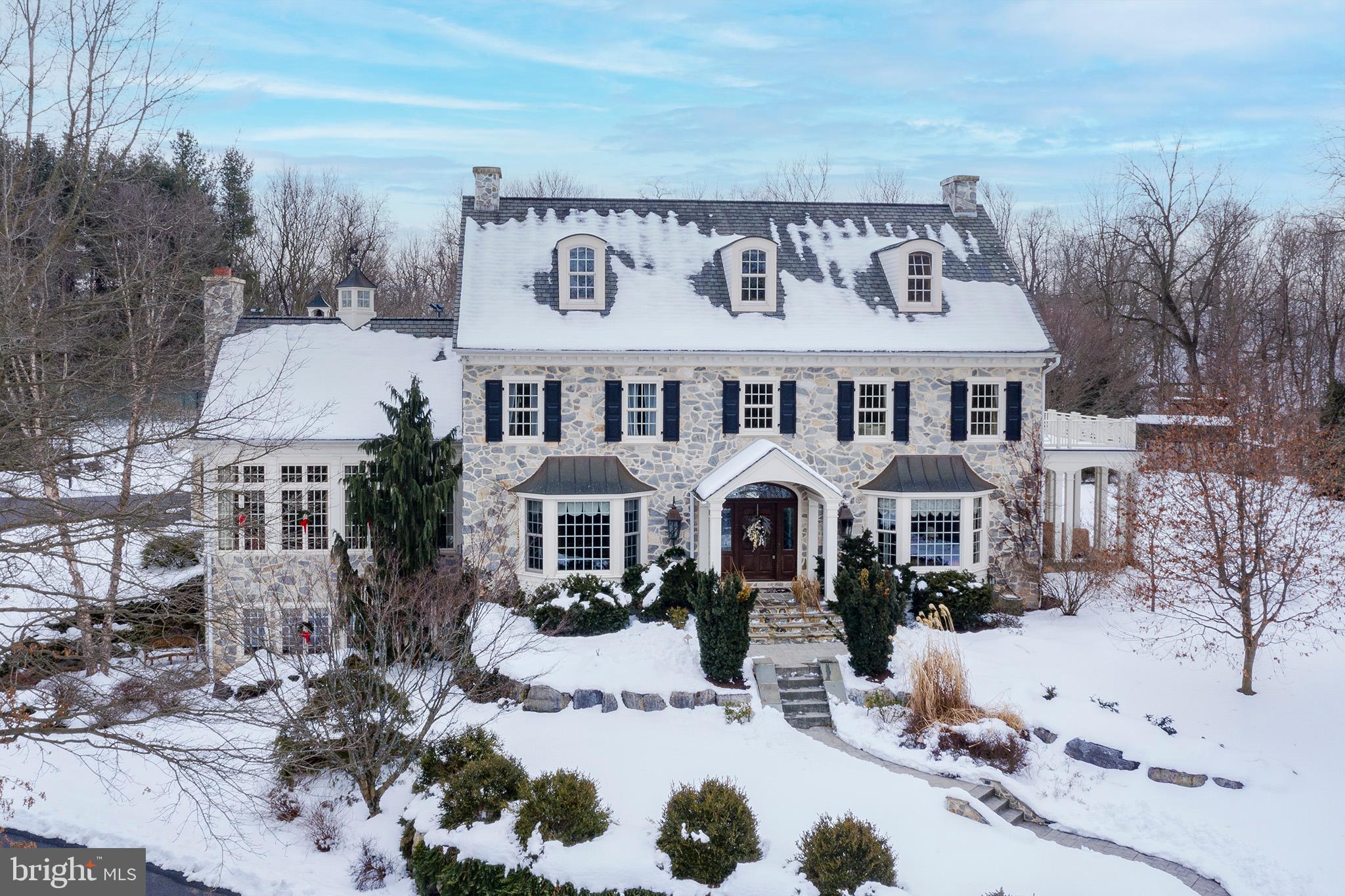 This Ebersole Brothers build is one of a kind. The contemporary mix of character and charm is in one word, perfect. The private creek lined drive entices your imagination until you arrive at the property of your dreams. From the moment you step in the door you will notice the custom finishes. The grand foyer, office library and one of a kind dining room, are perfect for entertaining. You will be in awe of the custom Merve Landis kitchen. The chef in your family will marvel over the baking station, custom spice racks, a warming drawer and even the butler pantry. Your guests will revel over the grandeur but you will fall in love with the details. 4 dishwashers for any event you can imagine, an ice machine for all seasons of events and a built-in table cloth rack for all the linens! The inside matters but the outside doesn’t hurt. Over 5 acres includes a gorgeous secluded plot of land which features a detached two car garage, tennis court and a view over the grounds from the owner’s suite! This home includes 3 large bedrooms on the 2nd floor, an additional over garage apartment and finally a basement apartment for individualized space and plenty of room for more bedrooms if desired. If that’s not enough, the exquisite above ground finished basement is perfect for gatherings. For the detail oriented this home features a manifold plumbing system, newer water softener, roof and recently serviced furnace. The kitchen and master bath have radiant heat in the floors and the entire home runs on geothermal! Even the garage features a French drain and heat so you are able to wash your car indoors and never worry about the cold! This home has been intricately designed and cared for. Top to bottom!