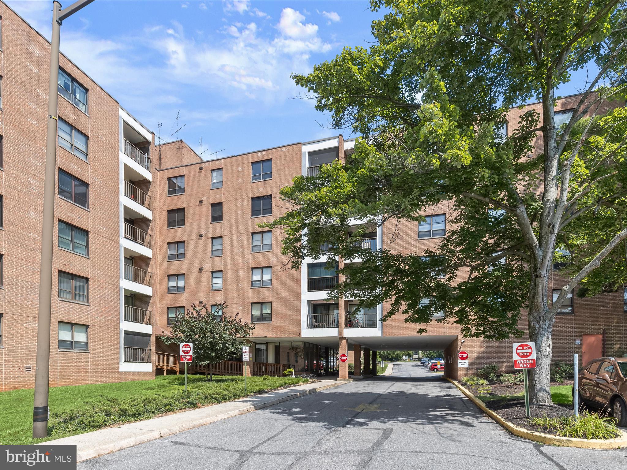 Introducing this two bedroom, one bathroom condo located in The Elmont on the third floor. Enter inside where the open concept living and dining areas offer abundant natural light and sliding glass doors to the balcony that overlooks the lawn and woods. The kitchen includes a pantry and stacked full-size laundry. The sizable primary bedroom features three closets, one of which is a large walk-in. Finishing the unit is the full bathroom with a walk-in shower, the second bedroom, and several storage closets. The unassigned parking lot has ample parking, while the lobby features 24-hour security. Excellent location near Pikesville and Mt. Washington, just minutes from the Reisterstown Plaza Metro SubwayLink Station, I-695, I-83, and I-795.