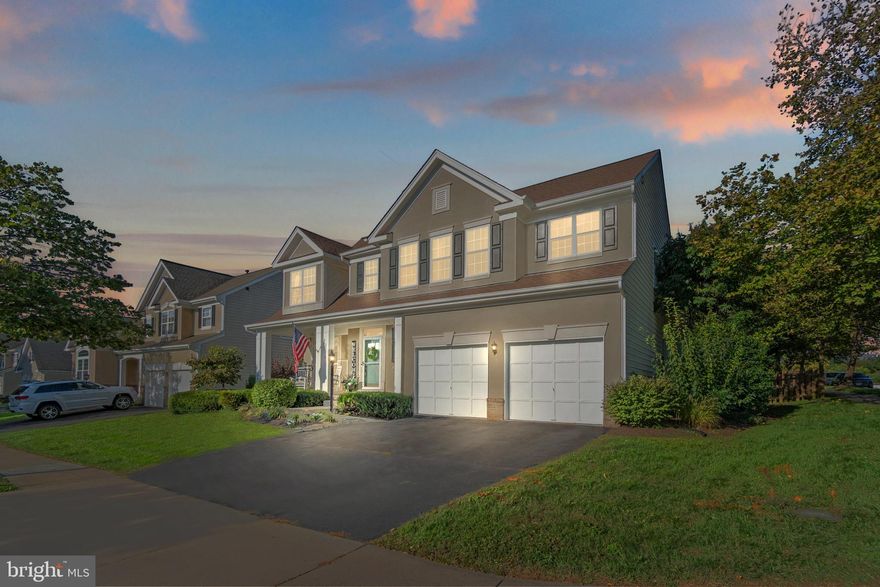 Multiple Offers Received - OFFER DEADLINE - Friday 9/23 @5pm - Please bring your best and final!
Welcome to your gorgeous new home nestled in the highly desired neighborhood of South Riding.  Attention to detail is shown in the design and upgrades of this home.  Custom board and batten accents, crown moldings, high ceilings, hardwood floors throughout, and an open floor plan.  As you enter the home you will see the two-story foyer with beautiful accent wall, staircase with iron-rod spindles, and custom paint throughout.  To your left you will find the living and dining room combo that is masterfully decorated for nice evenings with family and friends.  The floor plan truly opens up in the family room and kitchen area.  Any chef would love to work in the updated kitchen that features updated cabinetry, granite counter tops, a spacious island, and top of the line stainless steel appliances.  The large family room area is perfect for movie nights in front of the stone gas fireplace.  The recently updated (2020) outdoor space includes a trex wood deck, stone patio and walkway, and professionally landscaped fenced in backyard.   As your day winds down, spend quiet evenings in the primary bedroom with an updated (2017) spa like primary bath with expanded shower, large soaking tub, and dual vanities.  The upstairs also includes custom built-in bookshelves in bedroom #2, and updated hallway bath, and a large laundry room for convenience.  Make your way to the fully finished walk-out basement where you can entertain guests by the bar, make a kids play area, or add a game room for all.  Recent updates include:   Entryway board and batten accent wall (2022) fresh paint (2022), Trex wood deck (2021), stone patio (2021), termite and pest prevention system (2022), new refrigerator (2020), roof (2017), primary bathroom remodel (2017), finished basement (2015), Annual maintenance for the HVAC unit, and much more!  A must see in person home.  Don't miss this incredible opportunity.