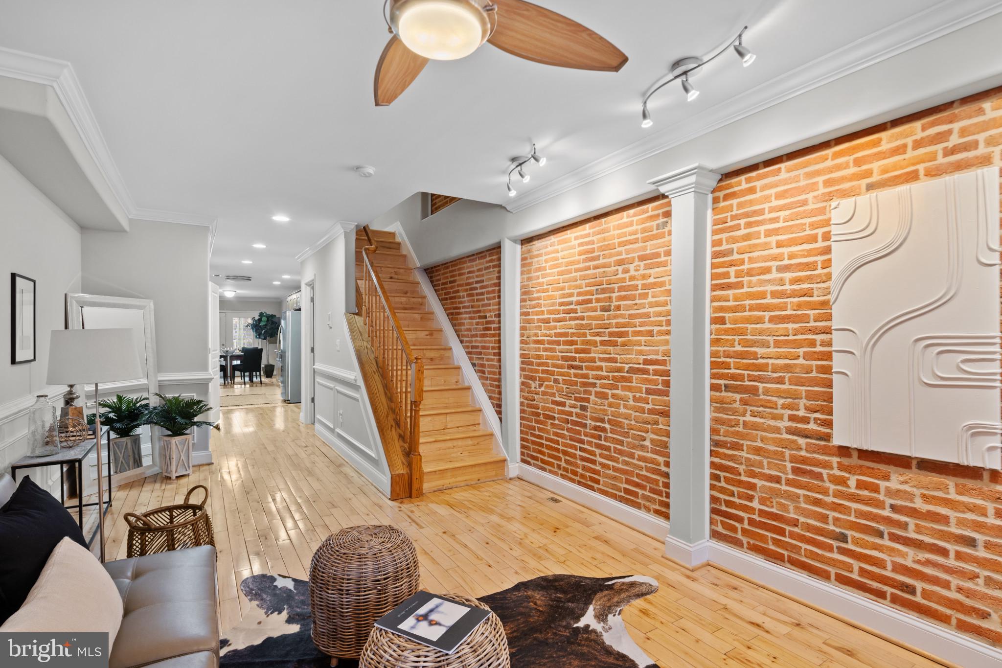 If you’re looking for the perfect Federal Hill home that offers a true au pair suite, in-law suite or an Airbnb with a private entrance for extra income, then 1528 Hanover St. just might be your perfect home. The basement suite comes with a full kitchen, W/D, closets and large windows. The property offers a large parking pad and a beautiful TREX roof deck with a wet bar/party room on the top level. Stepping inside you’ll be wooed by the gorgeous exposed brick, hardwood flooring, decorative fireplaces, natural light and massive main level. You have plenty of room for any size furniture and tons of entertaining space. The best part of the main level is the half bathroom that is conveniently tucked away. Upstairs there are two massive bedrooms and a stunning primary suite with en-suite bathroom and walk-in closet. There is another laundry room upstairs making life a breeze. Another convenient and thoughtful aspect of this home is the fact that you can access the roof deck without going through a bedroom. This property not only checks all of the boxes, but it’s well laid-out design offers a quality of life that just makes you smile. Schedule your private showing today!