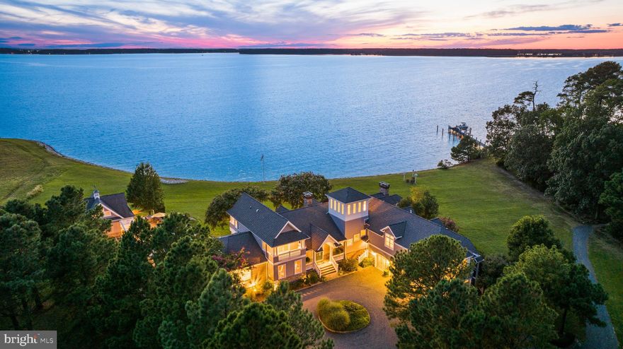 Welcome to Deep Neck Farm Lane, a stately waterfront farm overlooking Broad Creek with sweeping west and southwest views that stretch over the Choptank River to the Western Shore. This extraordinary estate captures dramatic sunsets, summer breezes, and shelter from northern winds, all from an unrivaled vantage point. 
Built in 2006 by a builder for their family, the 8,500± square foot residence provides thoughtful design and enduring craftsmanship. The home was built for hosting and gathering.  Seven ensuite bedrooms welcome family and friends, while soaring ceilings, three fireplaces, and a cozy morning room with a wood stove set the tone for gracious living. The turret, perched to catch the last rays of daylight, reminds one that every detail was designed around the water. The accessory structures and outdoor areas for entertaining are well-positioned to capture broad views and an immense water presence.  From the waterside deck of the residence to the pool house with bathroom, loft, kitchenette, and outdoor grill, to the riverfront fire pit, the focal point is Broad Creek.  The broad water portion of the shoreline is protected with 1,900 feet of stone revetment, and the remaining 2,500 feet of shoreline along Bridge Creek provides a natural setting. 
The farm has 13 acres under cultivation, with 3.5 acres in pasture.  In addition, a 40 x 60 pole barn, featuring a second-floor caretaker apartment, provides ample space for the hobby enthusiast, complete with a workshop and off-season storage.