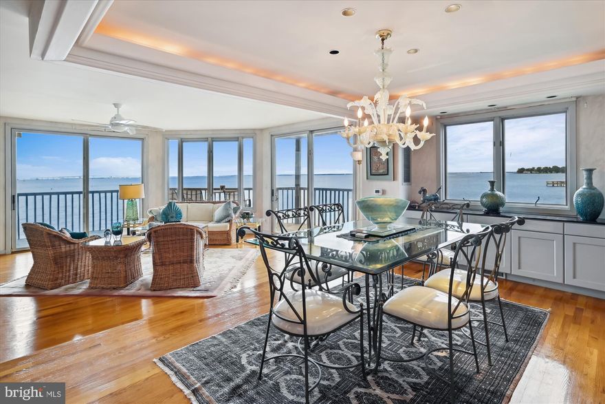 Experience unparalleled luxury and breathtaking panoramic water views of Chesapeake Bay in this exquisite four-bedroom, 4.5-bathroom dream home. With a thoughtfully designed four-level layout serviced by a private elevator, this rare property offers exceptional vistas and elegant living spaces on every floor.
The first-floor family room opens to a sandy beach and stunning water views, while the second floor features a sophisticated living room with a fireplace, a formal dining room, and a spacious eat-in kitchen adorned with a bay window and skylight. The third-floor primary suite is a serene retreat, showcasing sweeping Bay views.
Nestled in an exclusive community, rarely available on the market, residents enjoy front-row seats to awe-inspiring sunrises, the gentle lapping of waves, and refreshing Bay breezes. Exclusive amenities include a private sandy beach, a full-sized Bay-side pool, tennis and pickleball courts, an oyster-shell walking path, fishing piers, and a deep-water marina with direct access to the Bay. For dining and entertainment, an upscale on-site restaurant and Tiki Bar enhance the resort-style living experience.
Watch private yachts, Navy vessels, sailboat regattas, and the Blue Angels' annual May performances. Situated at the mouth of the Severn River where it meets the Chesapeake Bay, this exceptional home offers unmatched access to Annapolis’ historic charm, the U.S. Naval Academy, St. John’s College, premier dining, shopping, live theater, and transportation hubs.
Indulge in a lifestyle of elegance, comfort, and the natural beauty of Chesapeake Bay in this truly extraordinary property.