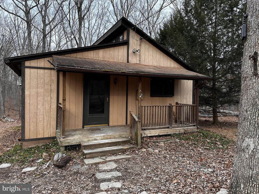 Looking for a cabin in the woods to fix up?   Then this 1 bedroom 1 bath may be just what you're looking for.  Private setting with easy access.  Approx. 4.37 acres.  Home is being sold as is.  No disclosures available. 
 Buyer should exercise due diligence concerning the property.  Multiple offers Highest and Best due by Noon 3/11.