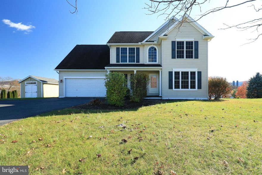 Heartwarming Two-Story perfectly positioned on a beautifully manicured .59 acre lot, on a calm cul-de-sac within the highly coveted Stonehenge subdivision.  The inviting covered front porch welcomes you home & leads you to the grand two-story foyer with a hardwood floor entry & natural light pours through-out the spacious rooms.    The main floor delivers a flex room that can be used as a home office or formal living room, a delightful dining room & a spacious eat-in kitchen with cherry cabinetry, solid-surface countertops, pantry & a darling bump-out dining nook.  This space opens to the family room that features a cozy gas fireplace offering the perfect space for everyday living or entertaining guests.  The hardwood staircase takes you to the second floor where you will discover the relaxing owner suite with trey ceiling, private full bathroom with an oversized dual vanity, jetted soaking tub, separate shower & a large walk-in closet.  There are 3 additional nicely sized bedrooms, another full bathroom & a convenient laundry room.  The partially finished basement boasts a 21x13 Recreational room with laminate flooring, another full bathroom & an additional laundry room & is radon mitigated.  Out back of the house, discover the lovely rear covered concrete patio, oversized deck & soothing hot tub.  Take in those glorious views of the neighboring mountain ranges as you sip on your morning cup of coffee, grill up your favorite food or hang out with family & friends.  Additional amenities include Natural Gas forced air heat, central air conditioning, powder room on the main floor, 20x25 attached 2-car garage & an included shed.  Country living with a convenient location, within 1 mile from I-99 allows easy access to I-80, just 9 miles from Beaver Stadium/Penn State University & just a few minutes from downtown Historic Bellefonte.  Truly a Home Sweet Home.  Sellers are offering a $5000 Seller Assist to buyer at settlement.
