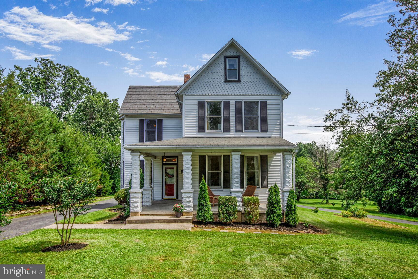 Welcome to this absolutely charming, porch-front colonial, perfectly situated on a spacious lot in desirable Kenwood Park. The inviting stone-columned front porch sets a warm and elegant tone, beautifully complemented by the timeless slate roof—both stunning examples of the home’s character.
Step inside to a welcoming foyer adorned with stained glass, where the original natural wood floors guide you through the home’s traditional, yet flexible floor plan—ideal for modern living. The formal front parlor showcases detailed crown molding and decorative window trim. The elegant dining room features chair rail molding, charming chandelier, and three bowed windows that gracefully wash the space with light.
The cozy family room offers more charm with crown molding, chair rail, wainscoting, and a beautiful built-in bookcase. The spacious, eat-in kitchen has been updated with crisp, white cabinetry, luxury vinyl plank flooring, stainless steel appliances, stylish hardware, and designer lighting. An island with a breakfast bar provides the perfect gathering spot, while double doors lead to a large deck overlooking the expansive backyard—ideal for entertaining. A full bathroom is conveniently located just off the side entrance hall.
Upstairs, the radiant primary bedroom boasts three-sided bowed windows and an additional front-facing window that bathes the room in natural light. All windows are handsomely trimmed, and a ceiling fan adds comfort. The second bedroom offers two closets, a charming window seat, and a ceiling fan, while the third bedroom features a double closet and ceiling fan. The upper-level hall bath is fresh, bright, and convenient to all bedrooms.
The expansive third-floor attic offers excellent storage or the potential to create a fourth bedroom, home office, or playroom. The lower level provides abundant storage space. This home is equipped with dual-zoned heating and cooling for year-round comfort.
Overflowing with character, charm, and timeless beauty—this is the one! Welcome home!
