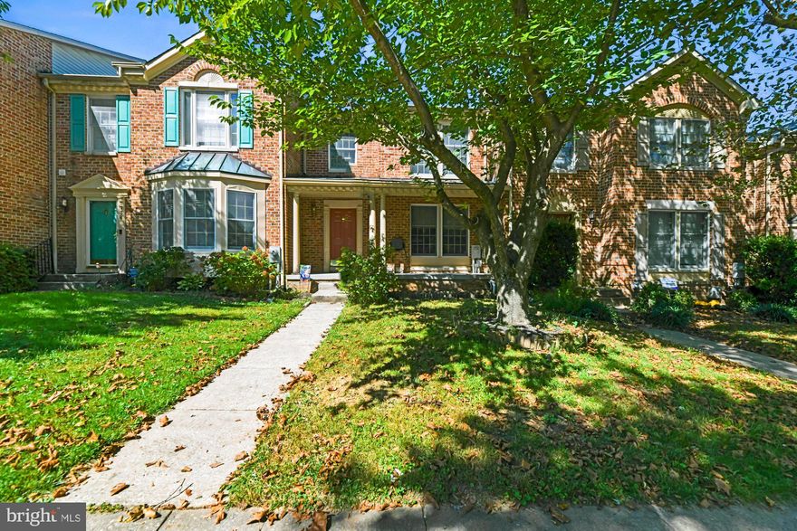 AWESOME ALL BRICK TOWNHOME IN THE HEART OF DESIRABLE & CONVENIENTLY LOCATED GREENSPRING EAST COMMUNITY.  ENTER ON THE MAIN LEVEL TO FOYER W/ HALF BATH & COAT CLOSET.  EAT IN KITCHEN WITH STAINLESS STEEL APPLIANCES & LOTS OF STORAGE. OPEN FLOOR PLAN W/ DINING/LIVING COMBO. LIVING AREA CENTERS AROUND GAS FIREPLACE AND SLIDING GLASS DOOR WHICH OPENS TO DECK & GREENERY.  UPPER LEVEL BOASTS 3 BEDROOMS & 2 FULL BATHS. PRIMARY SUITE HAS VALUTED CEILING, LARGE WALK IN CLOSET & ENSUITE BATH. LOWER LEVEL HAS BRIGHT & SPACIOUS FAMILY ROOM W/ WALKOUT TO YARD, HALF BATH, LARGE STORAGE & LAUNDRY ROOM. MODERN FLOATING STAIRS TO UPPER & LOWER LEVELS. HURRY!