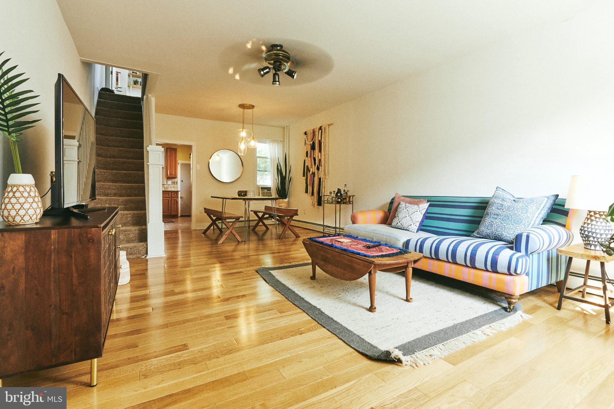 An ideal starter home set on the corner of a spacious Port Richmond block, nearby neighborhood gems such as Nemi, Ellie and Bird Coffee Bar, and Tin Can. Enter into a refined living area drenched in natural light, courtesy of the large front window, featuring hardwood floors that extend to the dining space, accessorized with a time capsule banister and brass chandelier from West Elm. The kitchen provides a continuation of natural light, stainless steel appliance package, shaker cabinets, and granite countertops. Exit to the back deck for an even higher dose of sunlight amid ample space for a vibrant container garden. The second floor of this home showcases 3 freshly painted bedrooms with high ceilings, a centrally located full bathroom, and hallway linen closet. Situated at the front of the second floor is the primary bedroom which has a custom wardrobe closet, calming any home search concerns about storage. The unfinished basement provides a highly desirable speed queen laundry system, recessed lighting, awning window, enclosed utility area, and additional storage opportunities. 2426 E Indiana Ave is located within walking distance to Richmond Street, known for local favorites such as Launderette Records, Pizza Richmond, ReAnimator, Carbon Copy, Mom Moms Kitchen, and Big Top Vintage. We welcome your showing!