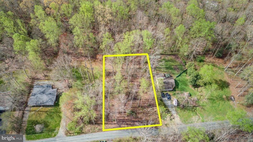 Don't miss this fantastic opportunity to build your new home in a convenient Stafford County location.  Hidden Lake is a gem of a lake community that is tucked just off Tacketts Mill in North Stafford and is NO HOA. 66 Hidden Lake Drive is just under 1/2 acre and a few short  blocks from the neighborhood lake.   Build now or buy and hold for the future.  The lot is raw land, meaning no public water or sewer. Seller welcomes you to do your due diligence.