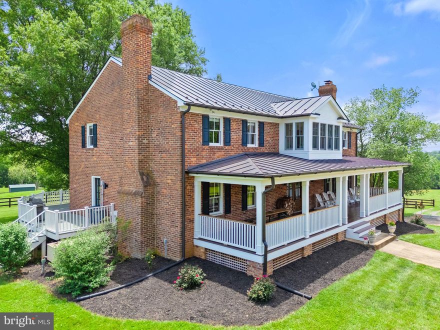 Welcome to Old Mill Farm, a meticulously updated four-bedroom all-brick residence nestled on nearly 20 acres in the heart of Middleburg, Virginia. This exceptional property boasts breathtaking mountain views, with stunning sunrises and sunsets, and provides outstanding riding opportunities (with permission) within the prestigious Middleburg Hunt territory.  The interior of the home features elegant refinished oak hardwood floors on the main level and primary bedroom, along with luxurious 5x10' leathered marble  island in the kitchen. It is equipped with new kitchen appliances and an updated HVAC system, ensuring modern comfort and efficiency. The inviting front porch, built-in bookshelves, and a well-organized walk-in pantry further enhance the home's appeal. Additional highlights include a lower-level workshop and a reliable whole-house generator.  Equestrian enthusiasts will appreciate the two-stall barn, complete with a tack room and a concrete aisleway fitted with rubber matting stalls for the utmost care of your horses. The property includes four paddocks that can be interconnected, two run-in sheds, and a spacious, flat paddock ideal for an outdoor grass ring. A generously sized, partially fenced open field offers excellent potential for cross-country riding or hay production, and it can also serve as additional paddock space for horses.  Old Mill Farm represents a rare opportunity to enjoy a refined lifestyle in a picturesque setting, perfectly tailored for both relaxation and equestrian pursuits.  The property is in land use and the seller is not responsible for rollback taxes.