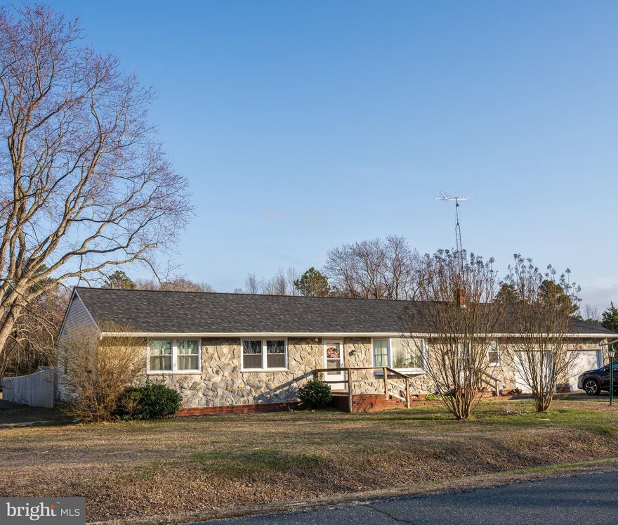Large One-Story Renovated Home with almost one acre of land. Welcome home to 5649 Thompsontown Road, just minutes outside of Cambridge. This home features an open floor plan with an amazing eat-in kitchen with granite countertops, stainless steel appliances, and soft-close cabinets, along with a sliding glass door that leads out to your back deck and enclosed backyard. You also have a separate living area/den, a large enclosed sunroom, and a door to your oversized attached 2-car garage with its own bathroom.

The home offers 3 large-sized bedrooms, with a full bath in the owner's suite. There is also more yard space beyond the fenced-in area if you wish to build a separate garage or shed. Corner lot. New HVAC with central air, new windows, a new electric panel, and a newer roof. This home will not last long.