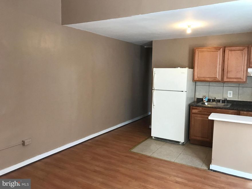 2nd floor 2 bedroom 1 bath apartment rental. Newer Kitchen. Lots of windows. Central location.