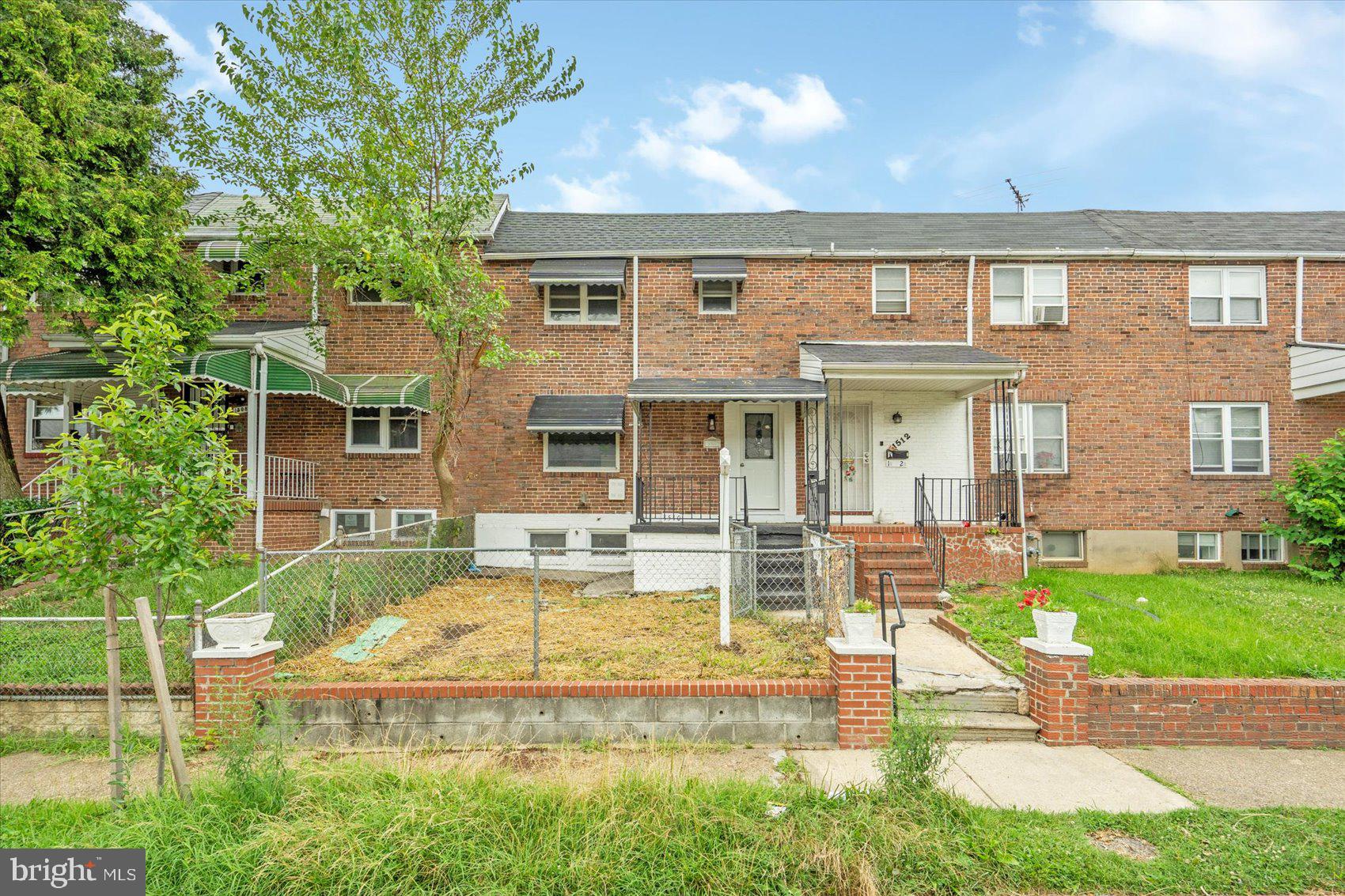 Newly remodeled 4BR/2BA brick Townhome located on a quiet street in the neighborhood of Berea. Make your way to the covered front porch, and open the door into your new home. Step into a stunning main floor boasting an open floor plan, tons of natural light, luxury flooring, and recessed lighting. This floor offers a large living room, spacious dining room, and stunning kitchen. The kitchen features plenty of cabinets, a separate pantry closet, brand new stainless steel appliance including a slide-in gas range, quartz countertops with a subway tiled backsplash, and a deep stainless sink set into an island with pendant lighting and breakfast seating for two or more. On the second floor is a large primary sized bedroom, two sizable secondary bedrooms, and a beautifully remodeled full bath with a vessel sink vanity. The lower level features additional living space which includes the fourth bedroom, a full bath with a vessel sink vanity, a laundry closet, a spacious family room, storage, and a walk-out to the fenced yard. From the kitchen step outside to a covered dual purpose patio/parking pad ideal for parking at least two cars, or for entertaining family and friends. This home is move-in ready with so much to offer new homeowners, and is located in close proximity to shopping, restaurants, and commuter routes.