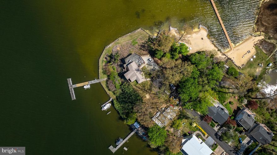 Welcome to your dream waterfront retreat in Crownsville, MD! This charming cottage-style home offers cozy, comfortable living space, featuring 3 bedrooms and 2 bathrooms. The property sits on a picturesque, 1-acre lot, showcasing a private sandy beach with kayak storage and a playground, 2 piers, 2 boat lifts, a jet ski lift, a large parking pad, and multiple outdoor sheds.

Experience the beauty of Severn River with expansive views from every angle while being conveniently close to Annapolis - either by boat or by car! Situated on a peninsula, this property has an approved conditional septic permit for a 3500 square foot, 5-bedroom home, offering endless possibilities for expansion. Embrace the tranquility of waterfront living and create unforgettable memories in this idyllic setting.

Don't miss the opportunity to own this slice of paradise in an exclusive waterfront location. Whether you're seeking a weekend getaway or year-round residence, this is the perfect canvas for your waterfront lifestyle aspirations.

Live your life on vacation!

Note:  This property includes 2 parcels totaling 45,872 square feet - over one acre total!