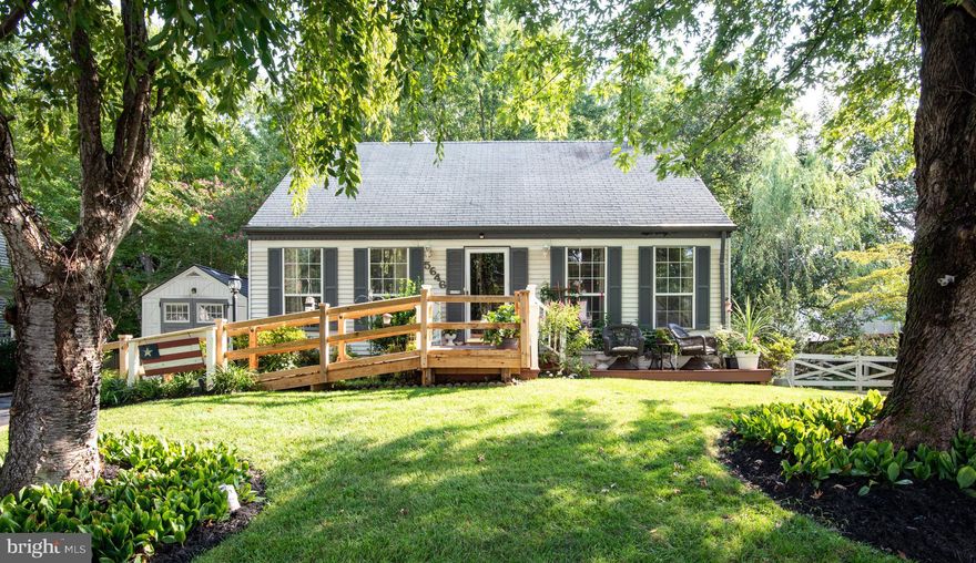 Location Location - Come see this cozy cape cod with a fenced backyard and multi level deck which backs to trees/park land (very secluded & private)  room in the backyard for flowers or vegetable garden or a swingset for kids, room for storage under deck,  there is a shed also -  Enjoy sitting on the front porch overlooking the beautiful front yard - there is a new ramp leading to the front porch as well from the driveway for easy entrance into the main level which boasts hardwood floors and a kitchen with granite counters, an island and stainless steel appliances, a pantry and recessed refrigerator for more space , walk out from the kitchen to the deck for grilling and overlook down to the next level decking , the main floor has a bedroom and newly remodeled full bath with walk in shower , upstairs has 2 large bedrooms, one has a walk in closet and both have extra storage in the eaves with lighting, the basement offers a familyroom leading out to the back lower deck and wonderful private backyard, full bath in basement and a bonus room to use for extra guest quarters/office/toyroom whatever your need - this location is close to tons of shopping, restaurants, local gyms & rec centers, great commuter location to DC, Ft Belvoir & Quantico.