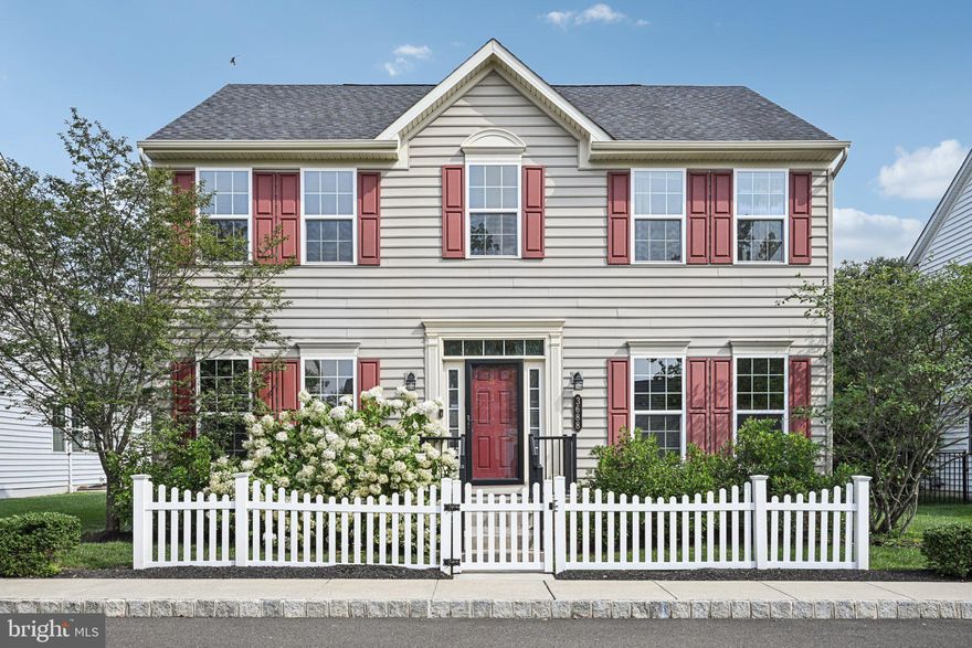 Welcome home this beautifully designed,  4-bedroom, 3.5 bath single family home in the highly sought-after neighborhood of The Overlook at Carriage Hill! Enter into the bright and spacious open-concept main level with gleaming hardwood floors and an abundance of natural light throughout. The formal living room, perfect as a playroom or home office, flows seamlessly into the inviting family room and adjacent breakfast area. The kitchen offers ample counter and cabinet space, a convenient pantry, and opens to the formal dining room—ideal for entertaining. A half bath completes the main level. Upstairs, you’ll find four generously sized bedrooms, including a spacious primary suite with a walk-in closet and private ensuite bath. The three additional bedrooms share a full hall bath, providing comfort and convenience for everyone. The fully finished basement features a dedicated laundry room, generous storage space, and a full bathroom with a walk-in shower—perfect for guests, extended stays, or multi-functional living. Continue outside from sliders in the kitchen to enjoy the newly added stunning patio, ideally situated between the home and the rear two-car detached garage, creating a private outdoor oasis. Lighted pathways along the side of the home and garage add both charm and function for evening enjoyment. Residents of Overlook at Carriage Hill enjoy low HOA fees that include common area maintenance, lawn care, trash and snow removal, plus direct access to Hanusey Park, a local gem known for its walking trails and endless community events. Located just minutes from grocery stores, pharmacies, shopping, dining, and downtown Doylestown, this home offers the perfect balance of convenience and community living.