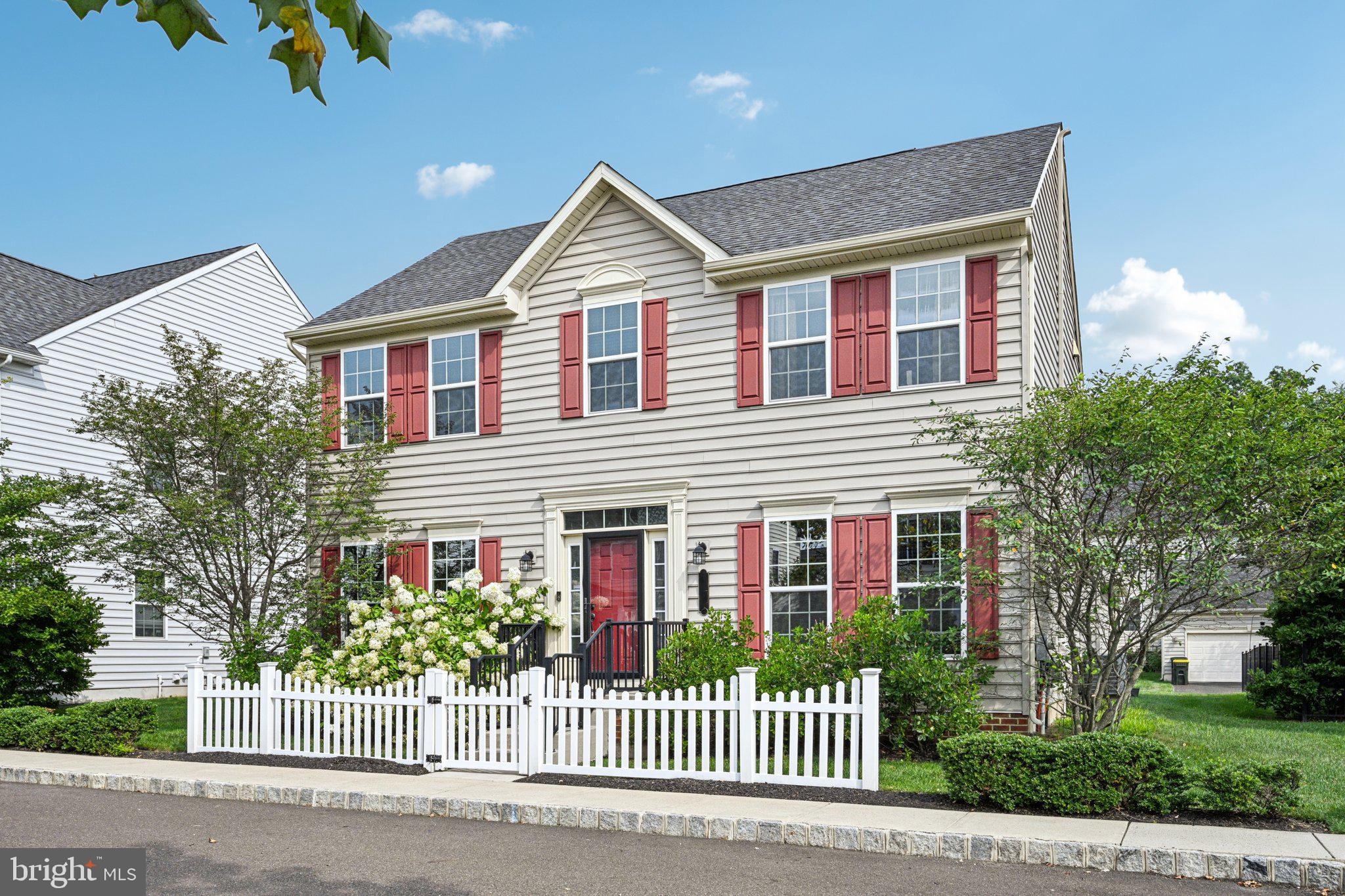 Welcome home this beautifully designed, custom-built 4-bedroom, 3.5 bath single family home in the highly sought-after neighborhood of The Overlook at Carriage Hill! Enter into the bright and spacious open-concept main level with gleaming hardwood floors and an abundance of natural light throughout. The formal living room, perfect as a playroom or home office, flows seamlessly into the inviting family room and adjacent breakfast area. The kitchen offers ample counter and cabinet space, a convenient pantry, and opens to the formal dining room—ideal for entertaining. A half bath completes the main level. Upstairs, you’ll find four generously sized bedrooms, including a spacious primary suite with a walk-in closet and private ensuite bath. The three additional bedrooms share a full hall bath, providing comfort and convenience for everyone. The fully finished basement features a dedicated laundry room, generous storage space, and a full bathroom with a walk-in shower—perfect for guests, extended stays, or multi-functional living. Continue outside from sliders in the kitchen to enjoy the newly added stunning patio, ideally situated between the home and the rear two-car detached garage, creating a private outdoor oasis. Lighted pathways along the side of the home and garage add both charm and function for evening enjoyment. Residents of Overlook at Carriage Hill enjoy low HOA fees that include common area maintenance, lawn care, trash and snow removal, plus direct access to Hanusey Park, a local gem known for its walking trails and endless community events. Located just minutes from grocery stores, pharmacies, shopping, dining, and downtown Doylestown, this home offers the perfect balance of convenience and community living.