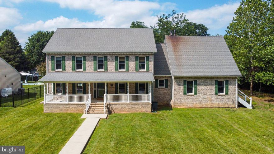 One of A Kind Custom Built Home with In Law Suite that conveys with 4 lots for approx 3 acres!  This Brick Front Colonial is at the end of the street facing Gunpowder State Park with a stone driveway/parking pad and detached garage (As-is condition). Enjoy the serenity of your surroundings from the covered front porch.  The In Law Suite has a separate side entrance that leads to the new Luxury Vinyl Flooring in the full kitchen/dining area/living room, the bedroom & Walk in closet have new carpet and a new glass sliding door, and a Full bath with tub/shower to complete the suite. There is a main level laundry area that connects to the main house with new LVF.  The Main level has a foyer, office, living room, separate dining room, kitchen, breakfast area, bar area, family room. Upper Level has a Primary Suite with 2 walk in closets-one has access to the 16 x 40 finished attic! use as another room or just great storage! The Primary bathroom has double sinks with new granite, tiled shower, corner jetted tub, LVF, Wifi shower light, heater, and the 2nd walk in closet. There are 2 more bedrooms and a hall bath on this level. AND a Bonus Room 23 x 20 to use as another bedroom/rec room/playroom/workout room etc. The main and upper levels were freshly painted for you. If that was not enough space, there is a full unfinished basement to use as storage or build more rooms! There are separate meters/ systems for the in law suite. No HOA. There are so many details in this beauty, please refer to the info sheet for all the details.