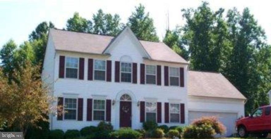 This charming large Colonial home features a freshly painted interior with 3 bedrooms, 2.5 bathrooms, two story foyer and new plank flooring throughout the main level and new carpet in all the bedrooms.  Large primary suite with walk in closet.  Eat in kitchen and separate dining room.  Large unfinished basement that is great for storage.  This property boasts  a large fenced-in wooded backyard and second story deck.  Just perfect for outdoor activities and entertaining.  Spacious two car garage provides ample space for vehicles and extra storage.  It is conveniently located near I 95, VRE, Route 1 and Spotsylvania Hospital.  Plenty of shopping restaurants and of course, Starbucks.  Pets are on a case by case basis with refundable pet deposit.