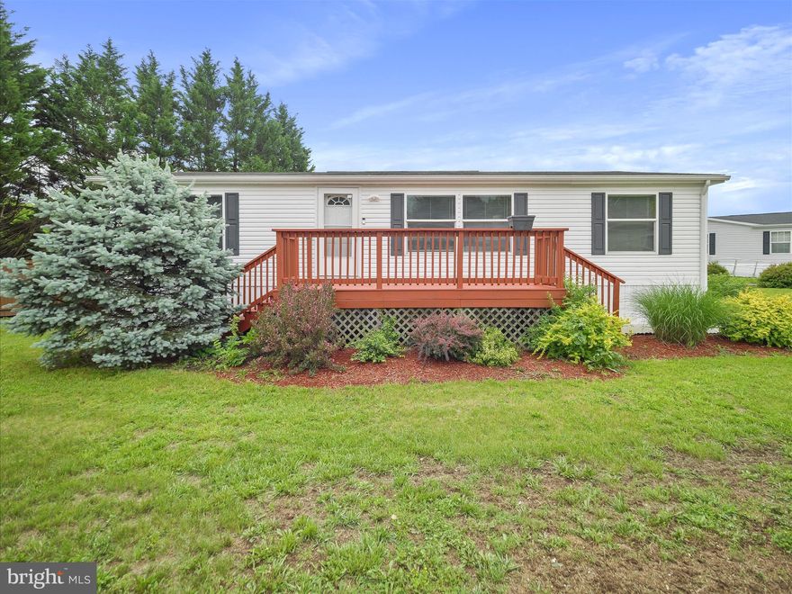 Well-maintained double-wide mobile in the Grapevine Village community! Featuring 3 bedrooms, 2 full baths. Carpet flooring throughout. Spacious living room. Eat-in kitchen with ample cabinetry and countertop space, island with seating, all new appliances, and dining room area. Primary bedroom with en suite. Detached 1-car garage with electric. Large deck patio to enjoy the outdoors. Ground rent of $525/month includes use of dumpsters. Buyer must be approved by park. Application fee is $50 per adult and can be obtained by calling the park. Pets allowed up to 20 pounds, maximum of 2 pets. No fences. Schedule your showing today!