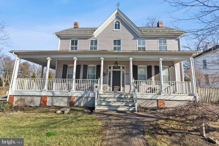 **PRICE IMPROVEMENT**
-Septic system pumped and serviced March 2025-
 Stunning 5BR/3.5BA late Victoria-era home nestled in the heart of Buckeystown's Historic District.  Ample parking is available for a minimum of seven cars within steps from your forever home.  Make your way to the covered wrap-around porch and open the door into a home filled with historic charm and modern comforts. The main floor boasts original hardwood flooring with custom woodwork in keeping with the craftsmanship of a Victorian time. Throughout the home you will find a soft color palette, tons of natural light, crown moldings, beadboard with chair rails, wide floor moldings, and several custom built shelving units on both the main and second floor.  On the main floor is a grand formal living room, an elegant dining room ideal when hosting guests, a half bath, and an amazing eat-in kitchen. The main floor is not complete without an owner's suite featuring an electric stove set into your classic brick fireplace, and a full bath with a walk-in shower. The country style kitchen features plenty of cabinets including two pantries, stainless steel appliances, quartz countertops with a subway tiled backsplash, and a wood burning stove on a raised brick hearth.  Just off the kitchen is a walk-in pantry and laundry room. On the second floor landing is a wall of bookshelves creating a library space leading to three sizable secondary bedrooms, one with window seating and two closets, a cozy office/playroom, and an updated full bath.  At the end of the hall is access to the primary suite featuring an oversized walk-in closet with built-ins, just steps from a full bath, and a private stairway that leads to the kitchen below.  Another set of stairs takes you to the unfinished attic space ideal for storage or additional living space. The lower level is unfinished, clean and dry, offering tons of possibilities.  From the dining room, or kitchen, step outside to a brick patio in the yard boasting plenty of green space, adult trees, landscaping,  and a detached double sized shed. This home is located in a historically rich community and is well known for preserving the architectural significance of homes built in the late nineteenth and early twentieth centuries. Ideal for any new homeowner who wants the comforts of small town living within a short drive to a variety of shopping, restaurants, and cultural experiences.