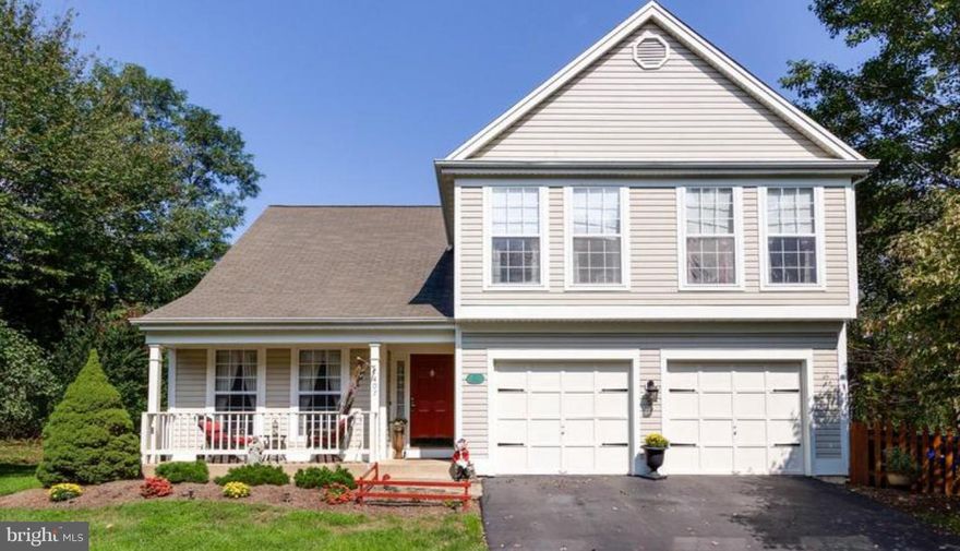 Open floor plan with vaulted ceilings. Sunroom, Formal living room, dining room, bright kitchen, skylights, breakfast nook. Two car garage. Short walk or bile ride to downtown